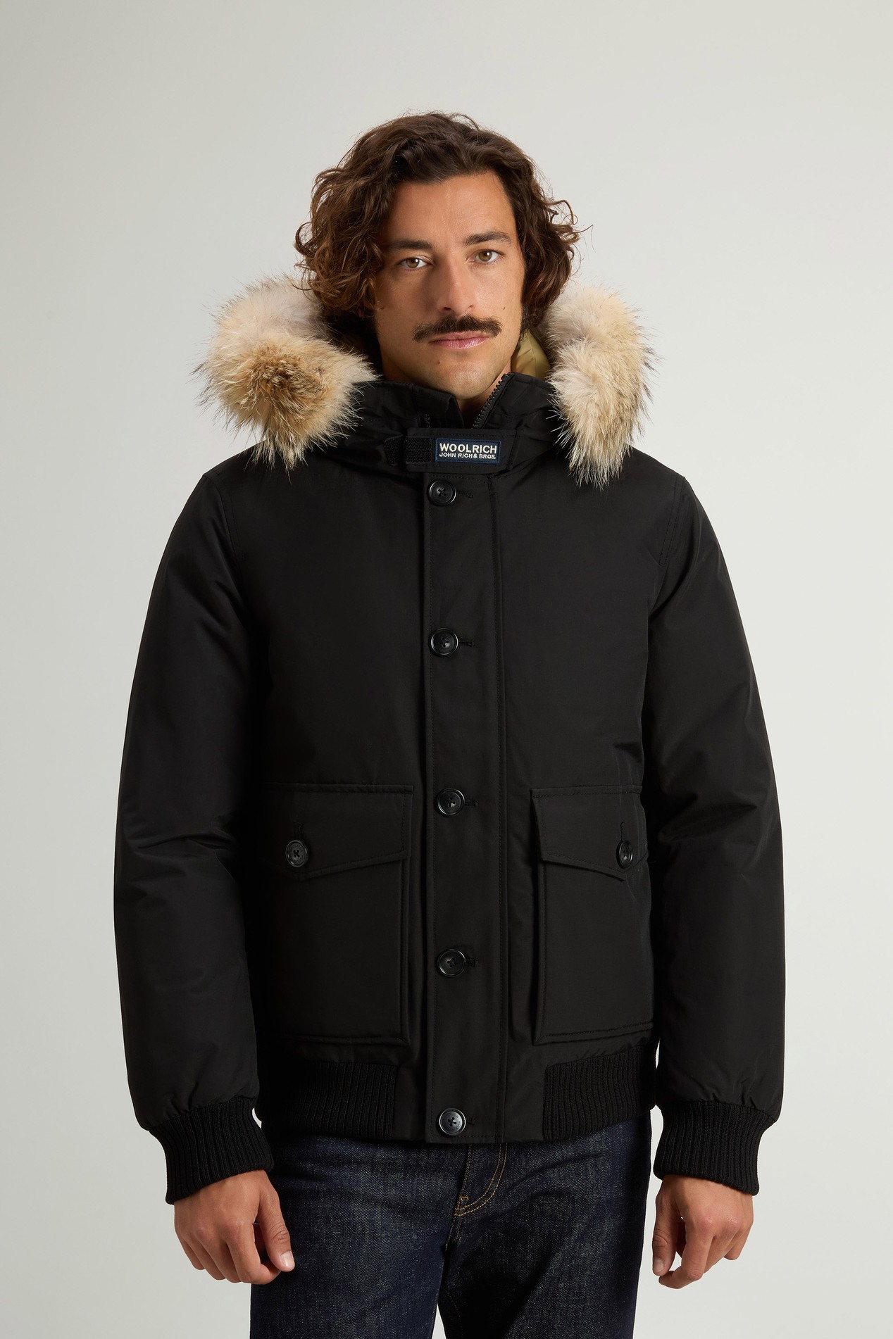 Padded Polar bomber jacket in Ramar Cloth with hood Black photo 1 | Woolrich