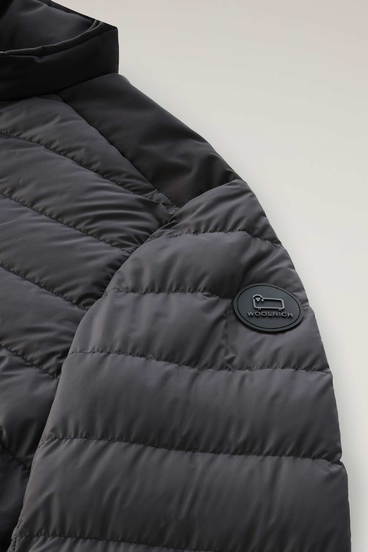 Bering Tech Lightweight Hybrid Down Jacket in Microfibre Black photo 4 | Woolrich