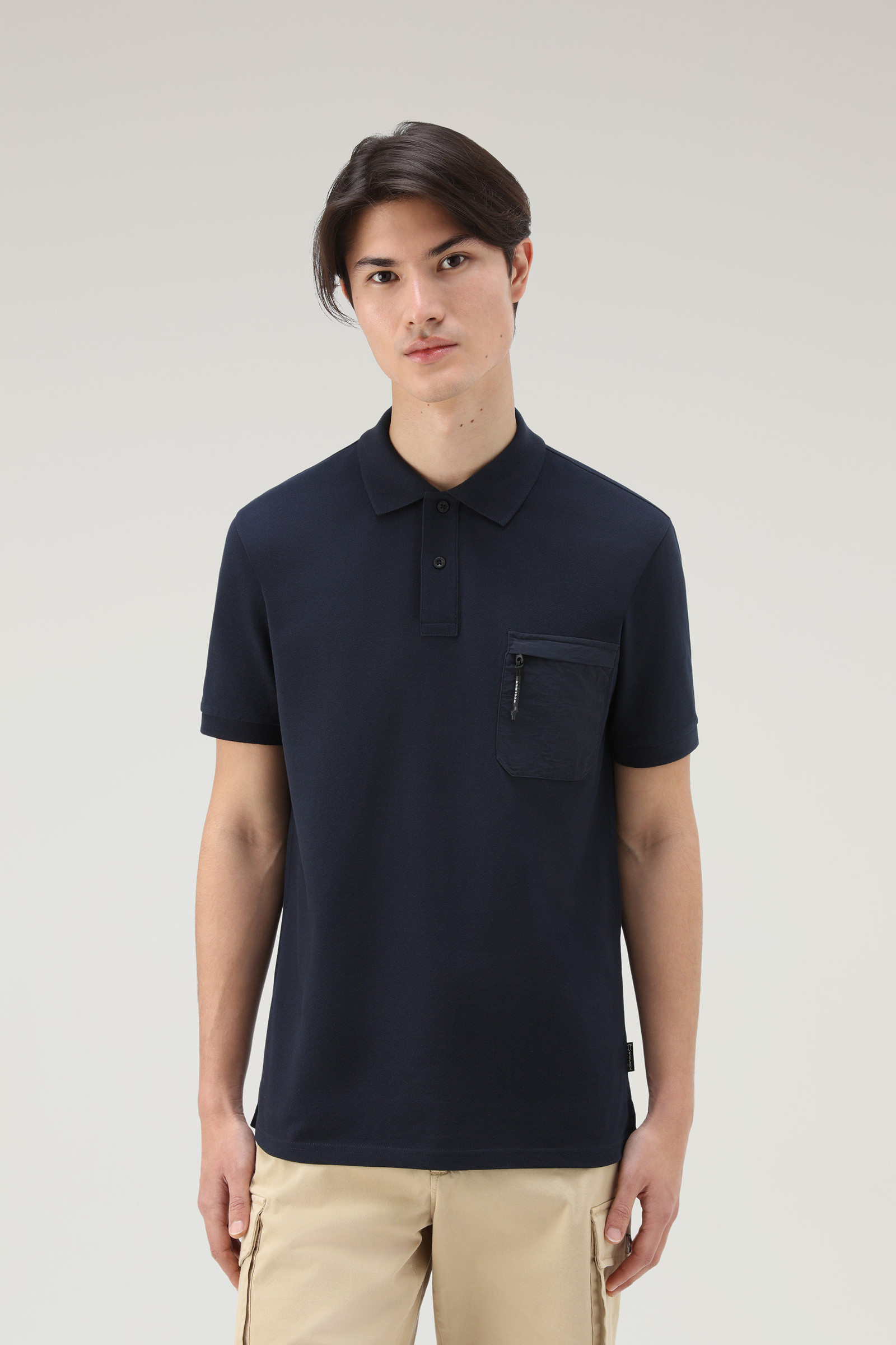 Polo a maniche corte in piqué di cotone elasticizzato blu | Woolrich