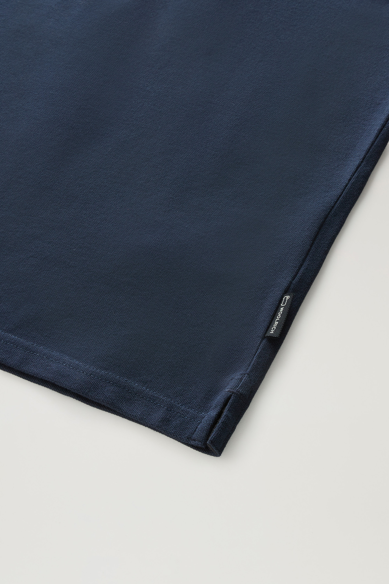 Polo a maniche corte in piqué di cotone elasticizzato blu photo 7 | Woolrich