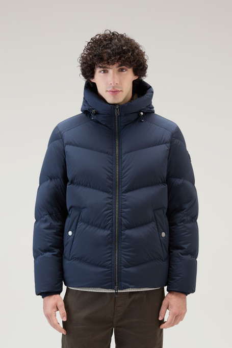 Unlock Wilderness' choice in the Woolrich Vs North Face comparison, the Premium Down Jacket in Stretch Nylon by Woolrich