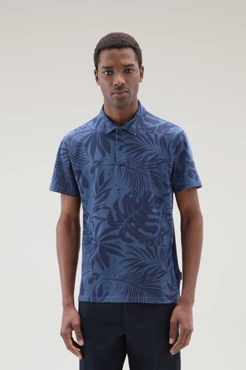 Garment-Dyed Polo Shirt in Stretch Cotton with a Tropical Print Blue | Woolrich