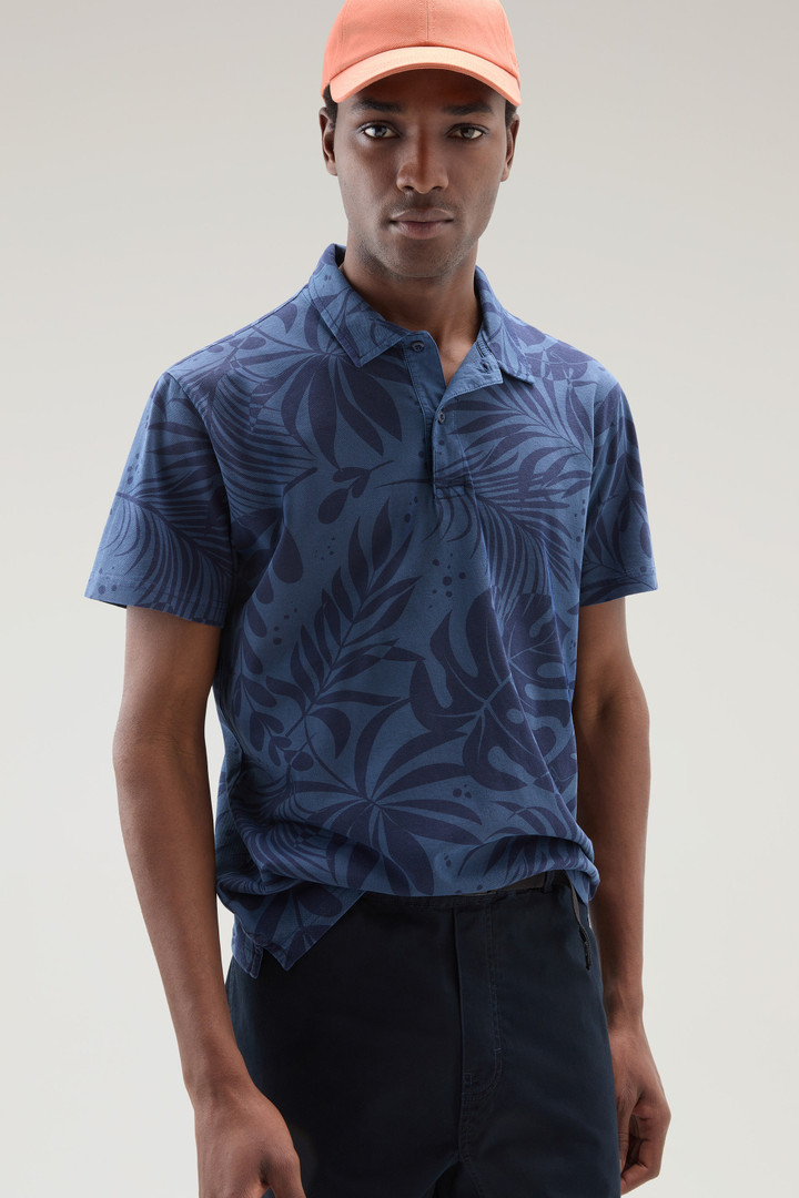 Garment-Dyed Polo Shirt in Stretch Cotton with a Tropical Print Blue photo 4 | Woolrich
