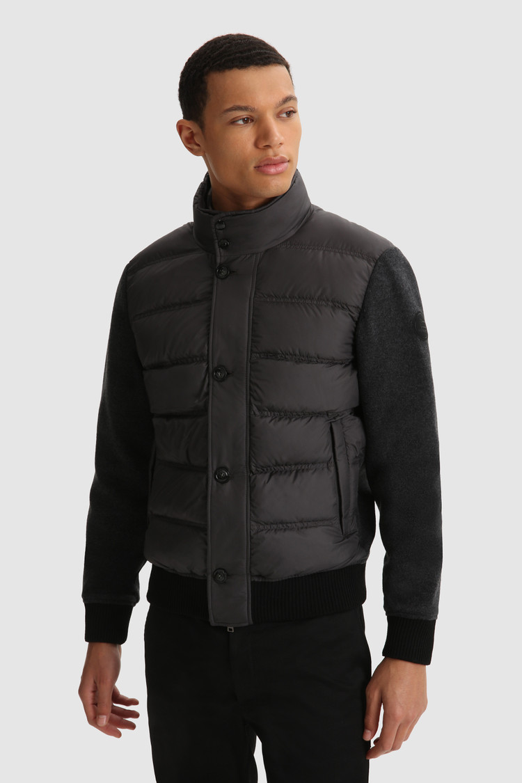 Sweater met volledige rits, gewatteerd en met gebreide mouwen