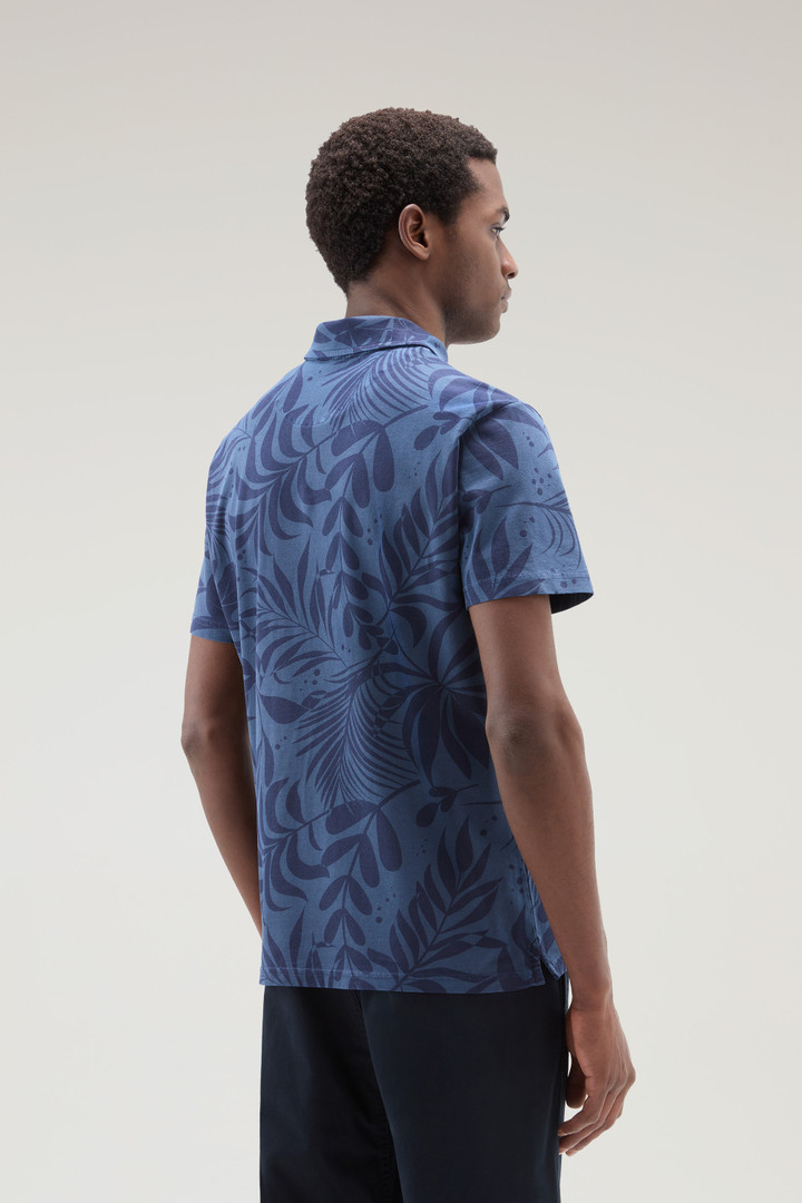 Garment-Dyed Polo Shirt in Stretch Cotton with a Tropical Print Blue photo 3 | Woolrich