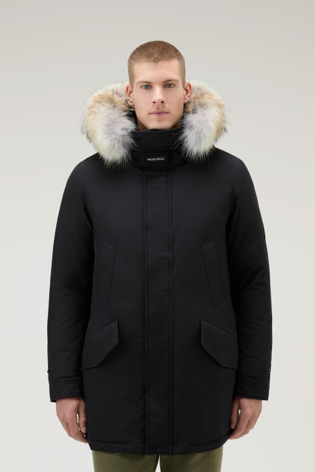Unlock Wilderness' choice in the Woolrich Vs North Face comparison, the Polar Parka with High Collar and Fur Trim by Woolrich