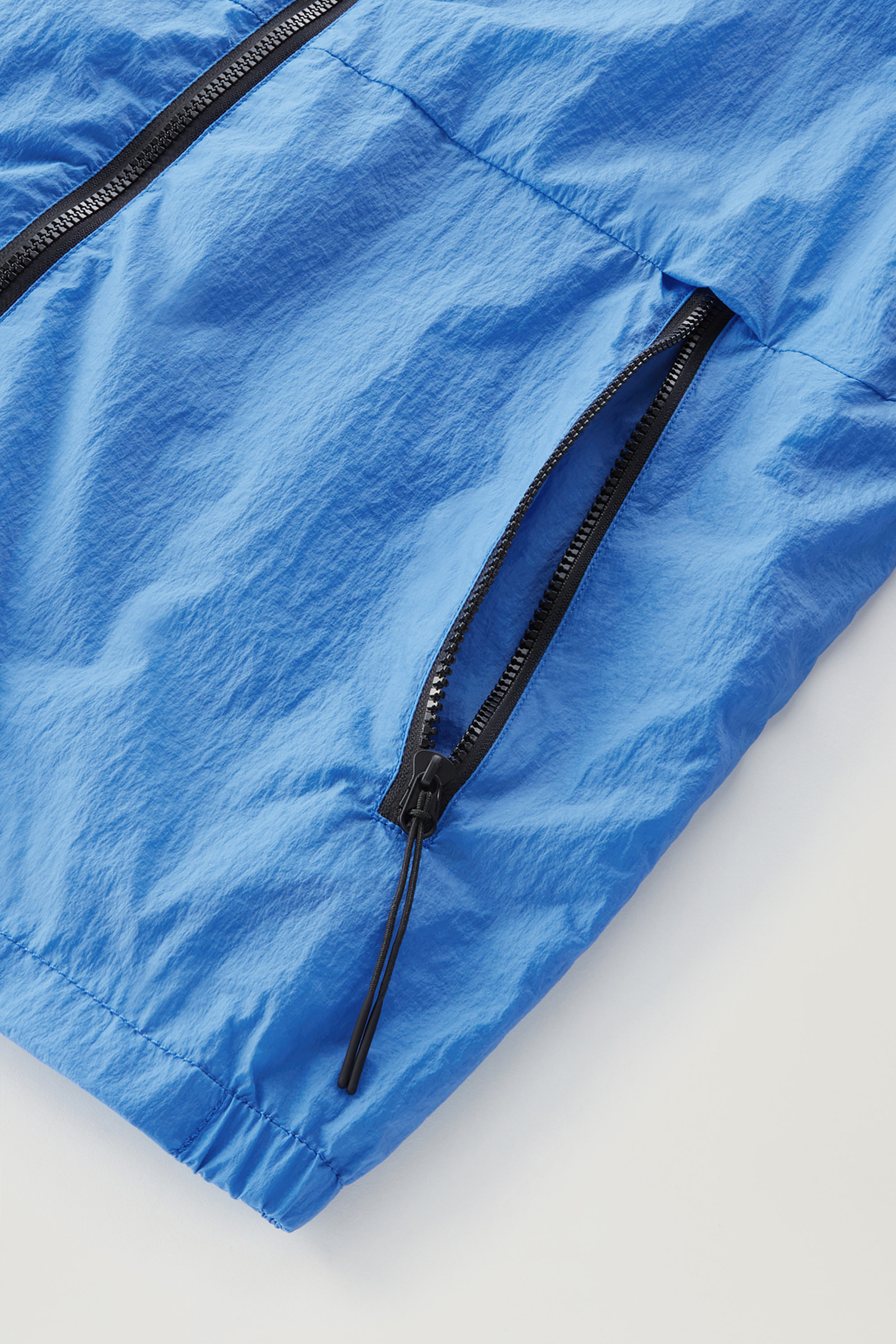 Veste coupe-vent repliable en nylon crinkle bleu photo 9 | Woolrich