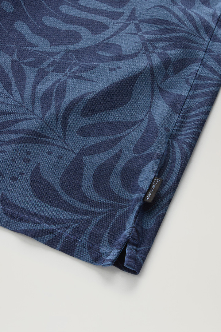 Polo tinta in capo in cotone elasticizzato con stampa tropical Blu photo 7 | Woolrich