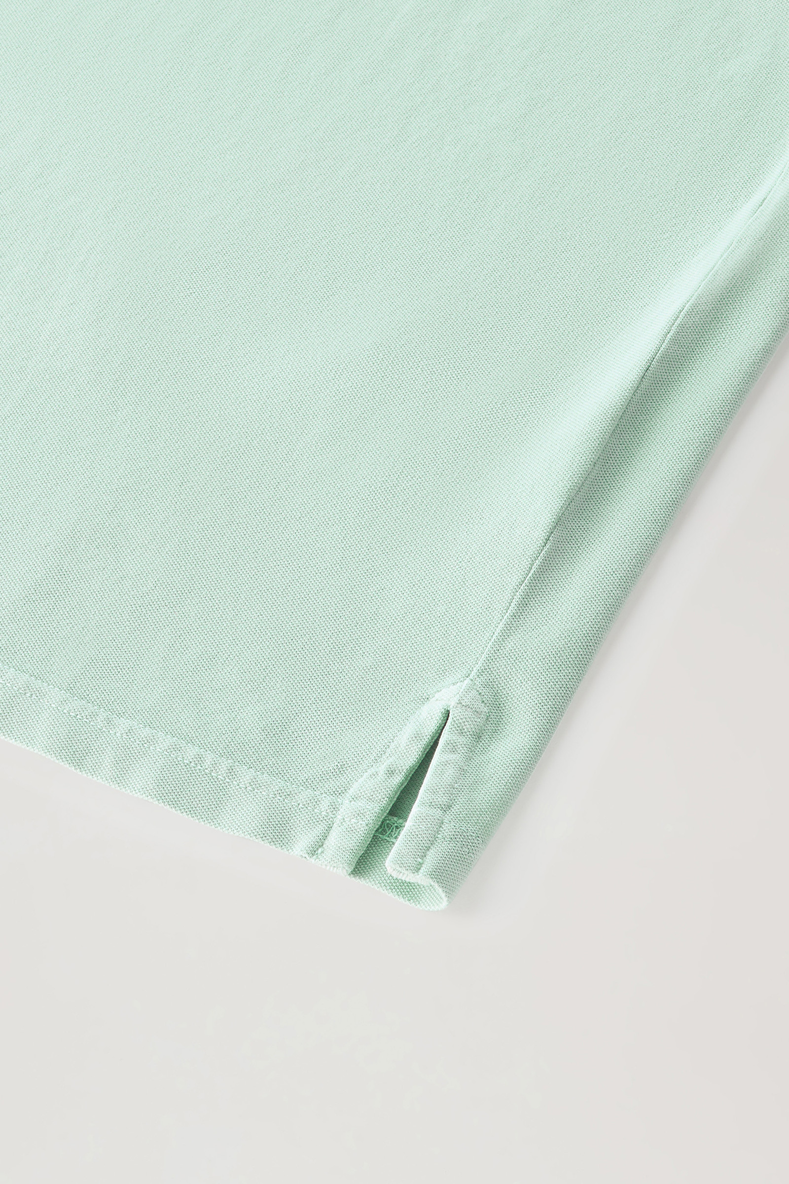 Polo Mackinack tinta in capo in piqué di cotone elasticizzato verde photo 7 | Woolrich