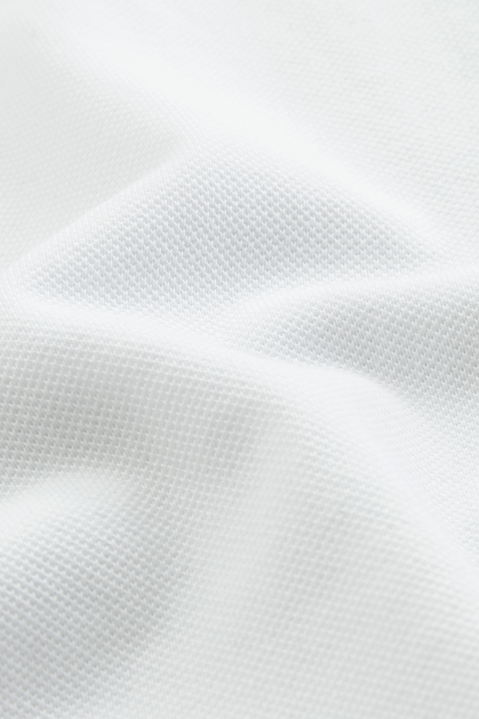 Polo Gracious en piqué de coton extensible blanc photo 7 | Woolrich