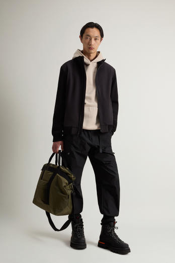 Veste Hybrid en Tech Softshell Noir | Woolrich