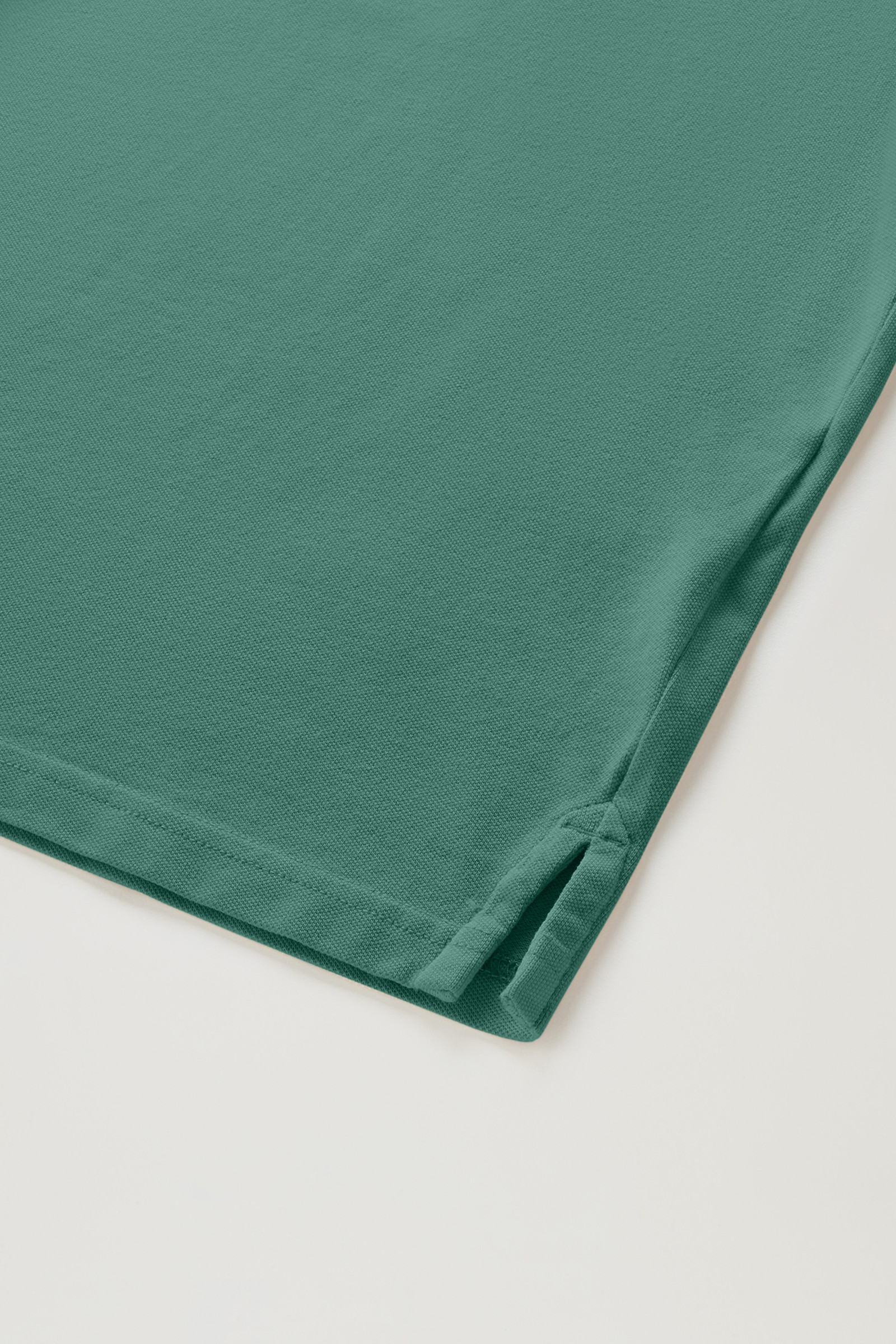 Mackinack-poloshirt van achteraf geverfd katoenpiqué met stretch groen photo 7 | Woolrich